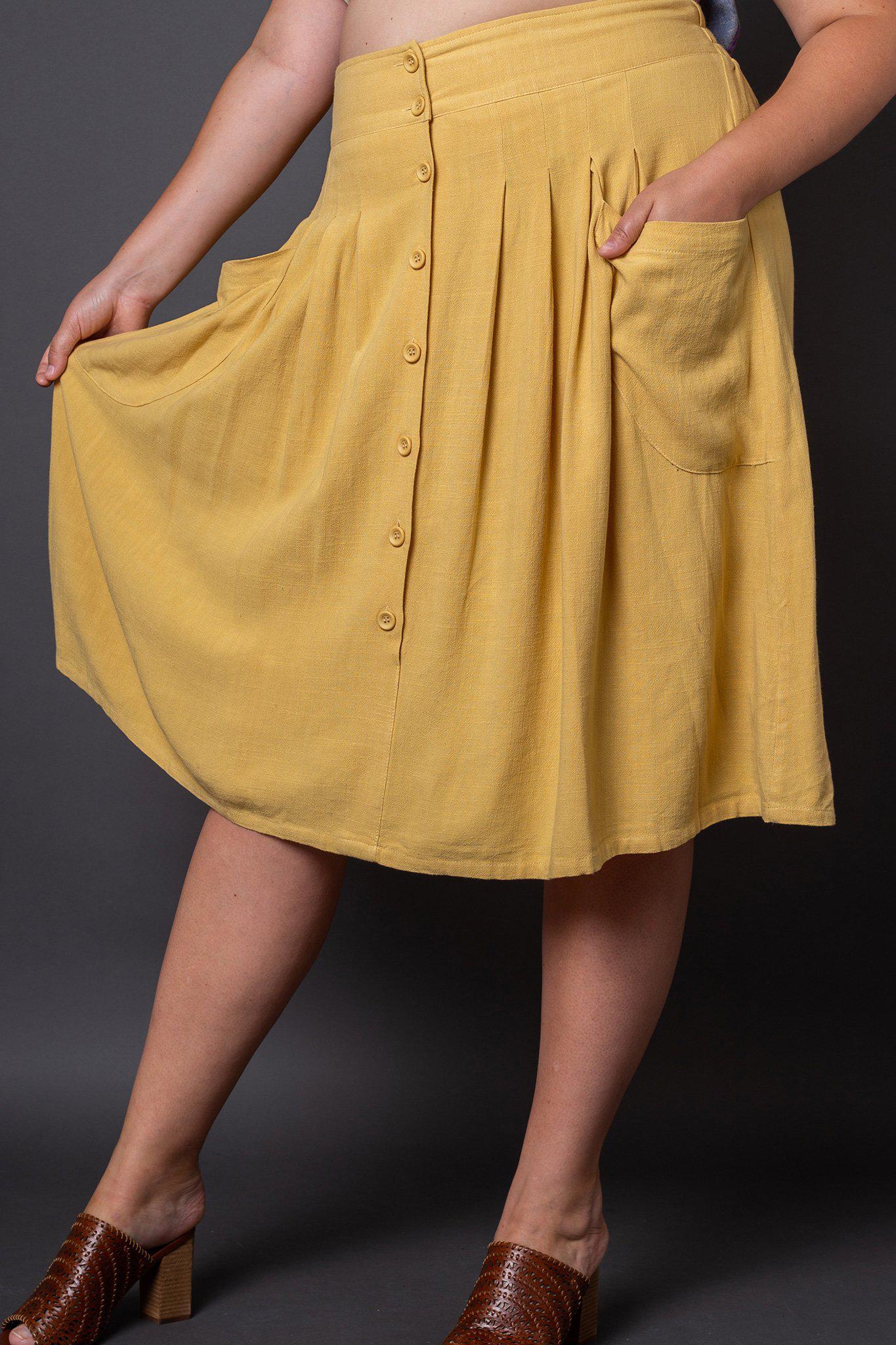 Claire Yellow Button-Front Midi Skirt- 3/4 view on model