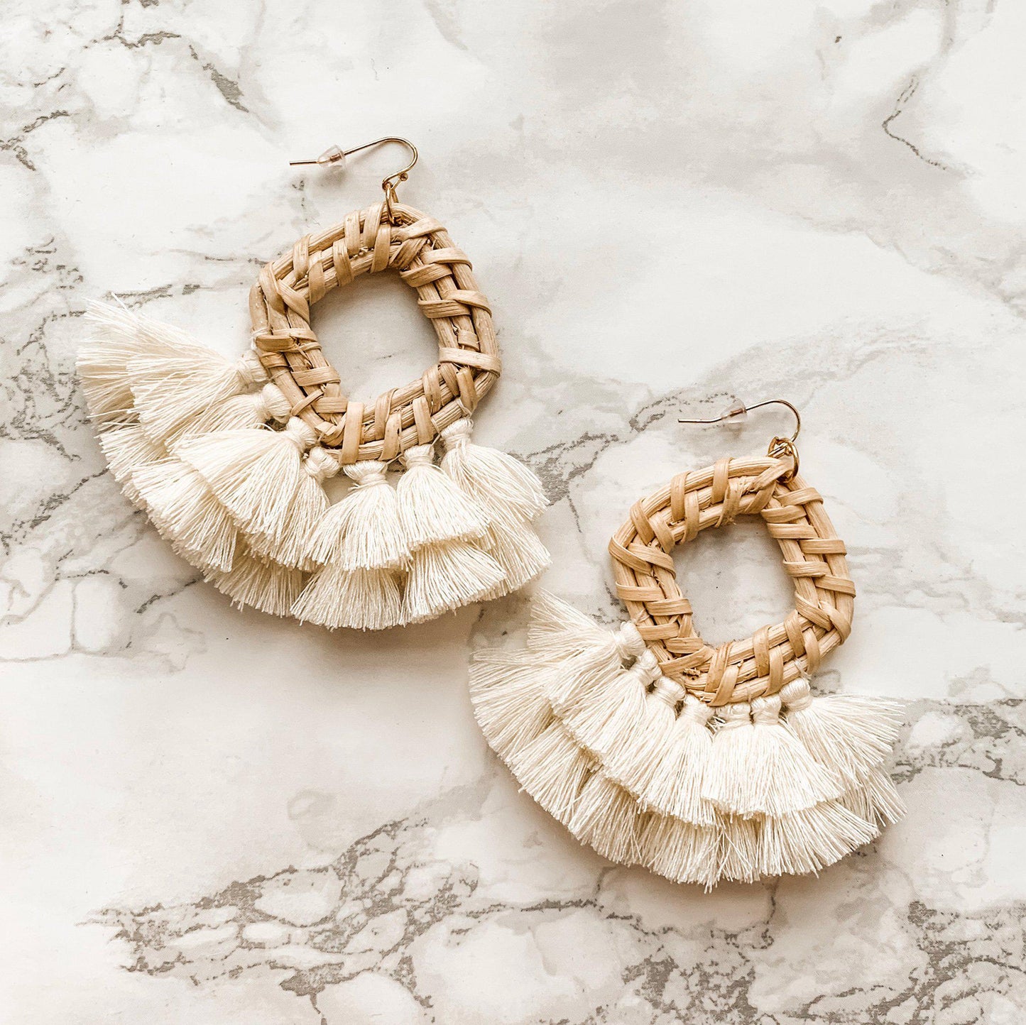 Grace Rattan Ivory Fringe Earrings flat on white background