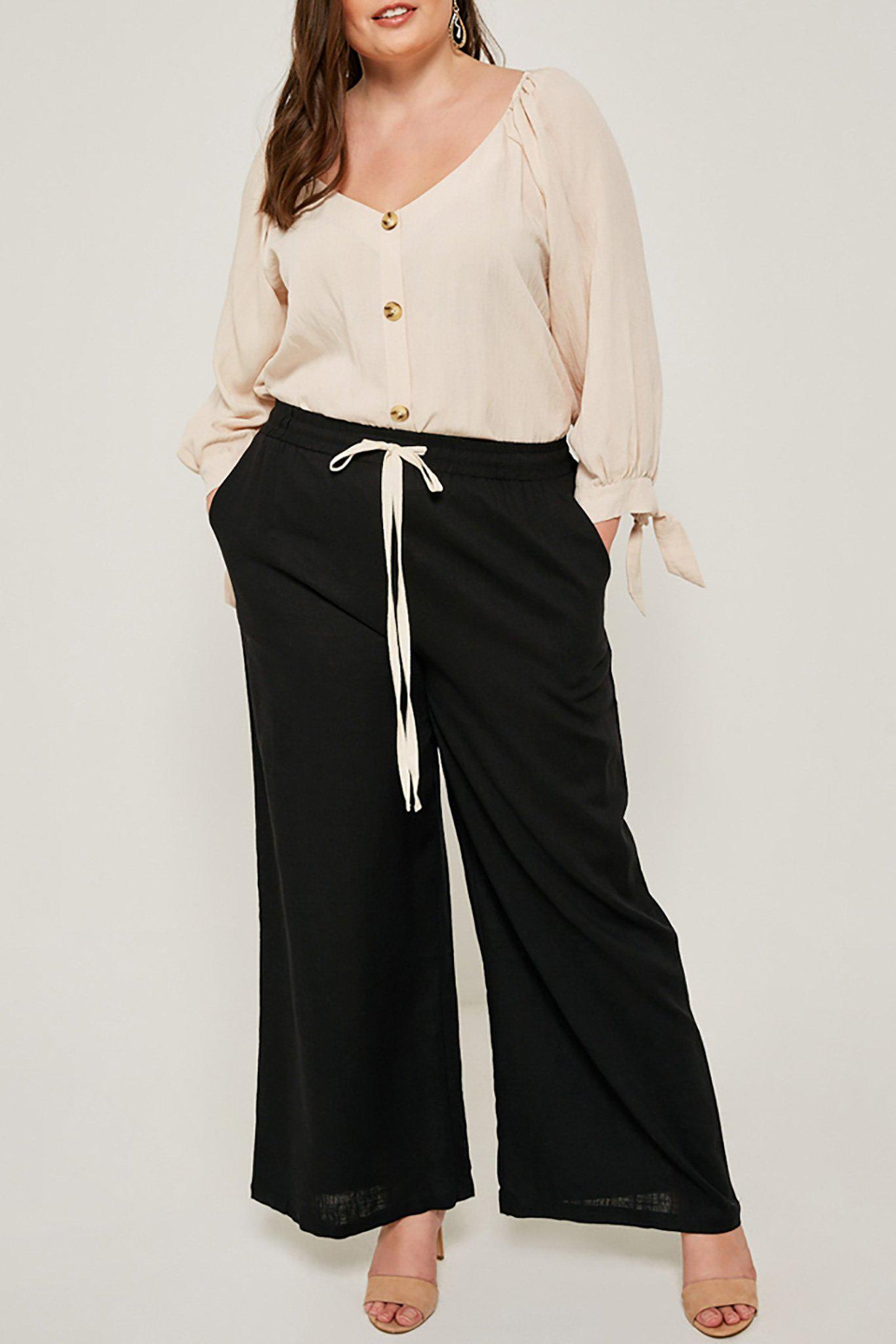 Plus-size wide leg black Madison pant full outfit view on model