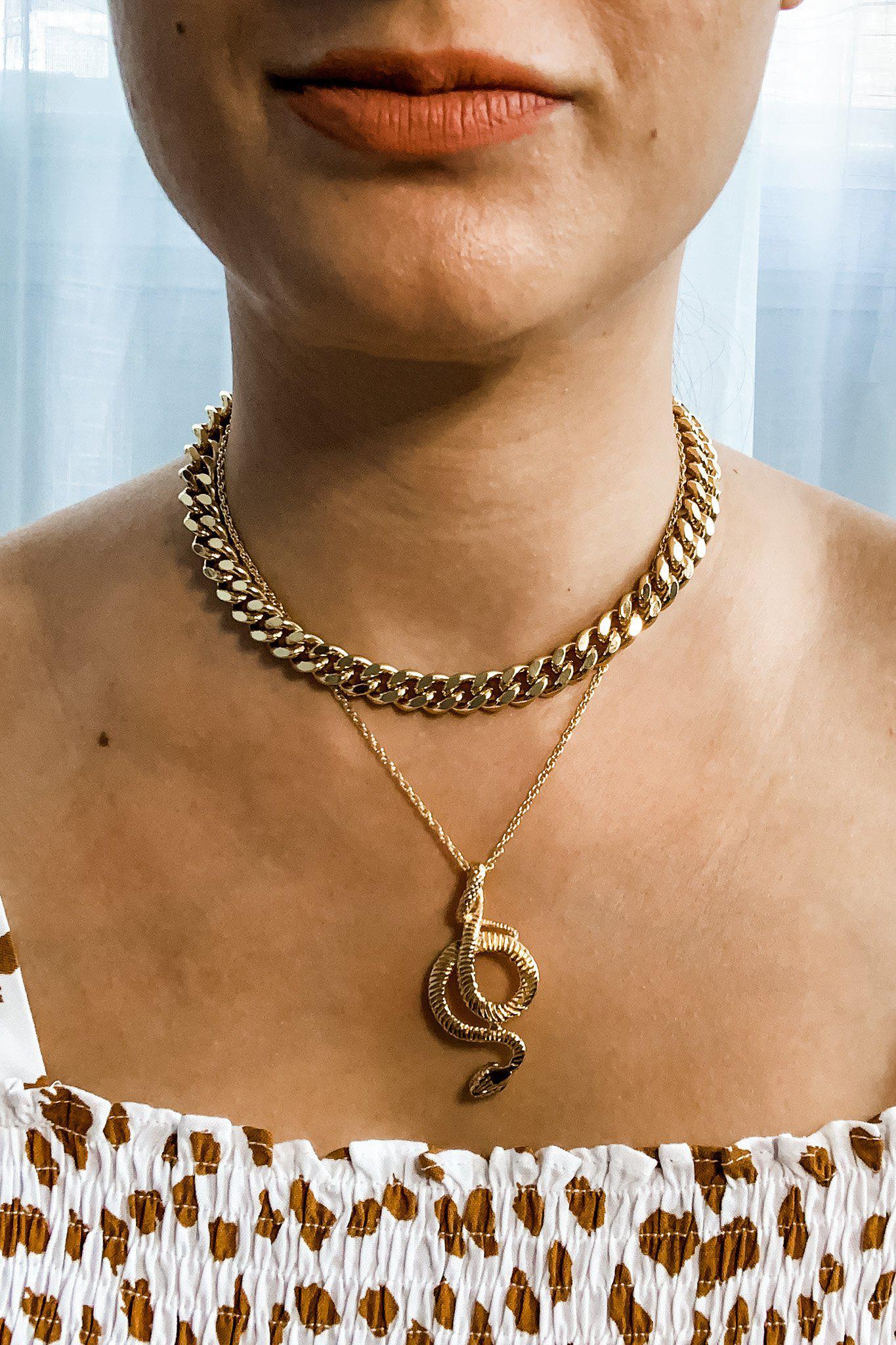 Snake Charmer necklace layered with Giselle chain necklace on model